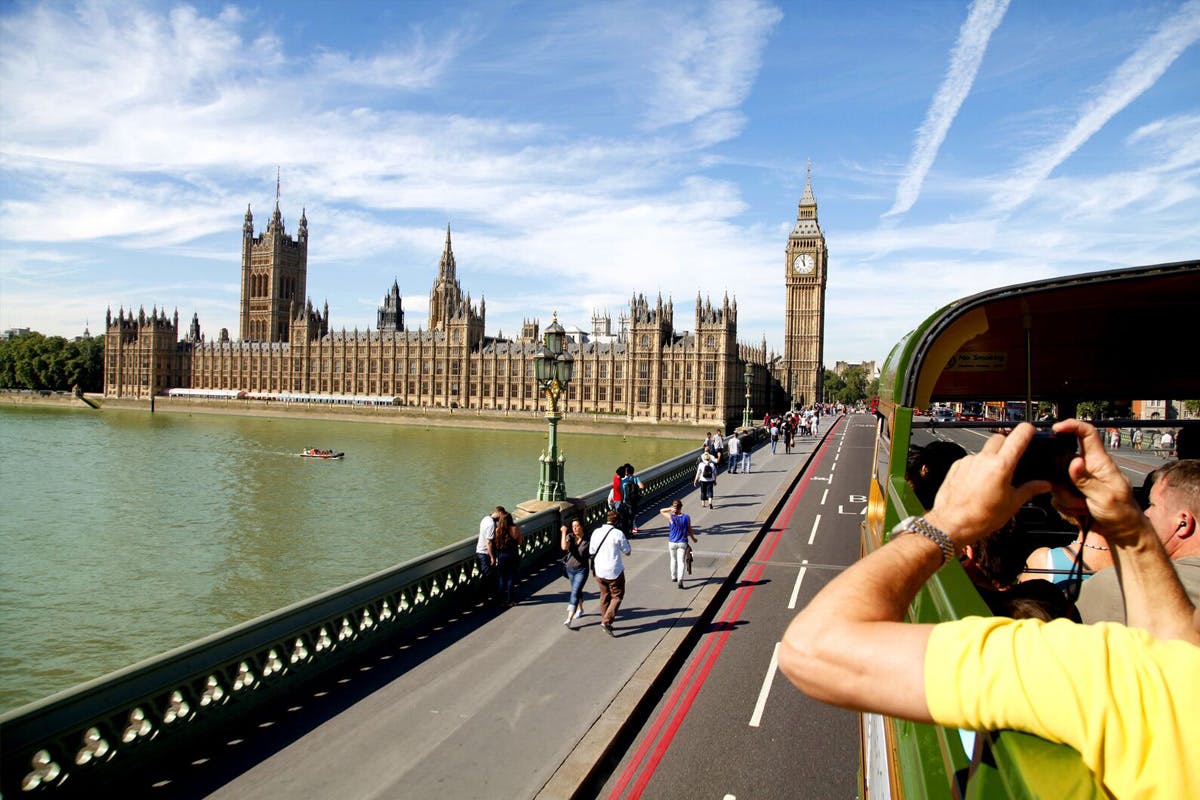 vintage red london bus tour with thames river cruise