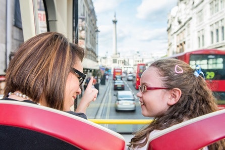 Explore London with Hop-On, Hop-Off Sightseeing Bus Tour and River Cruise for a Family of Four
