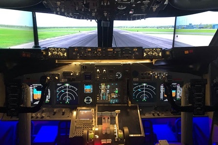 Immersive Airport Check In and Flight Simulator Experience with Refreshments for Four